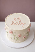 Oh baby cake with hand-piped roses and pearls