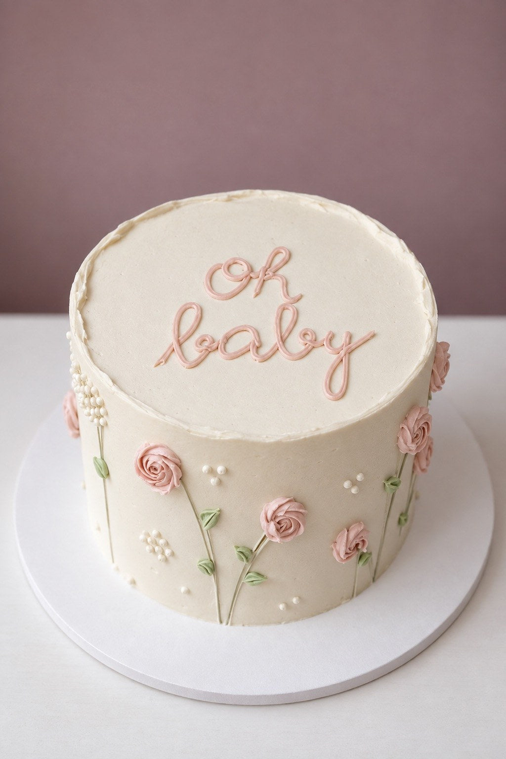 Oh baby cake with hand-piped roses and pearls